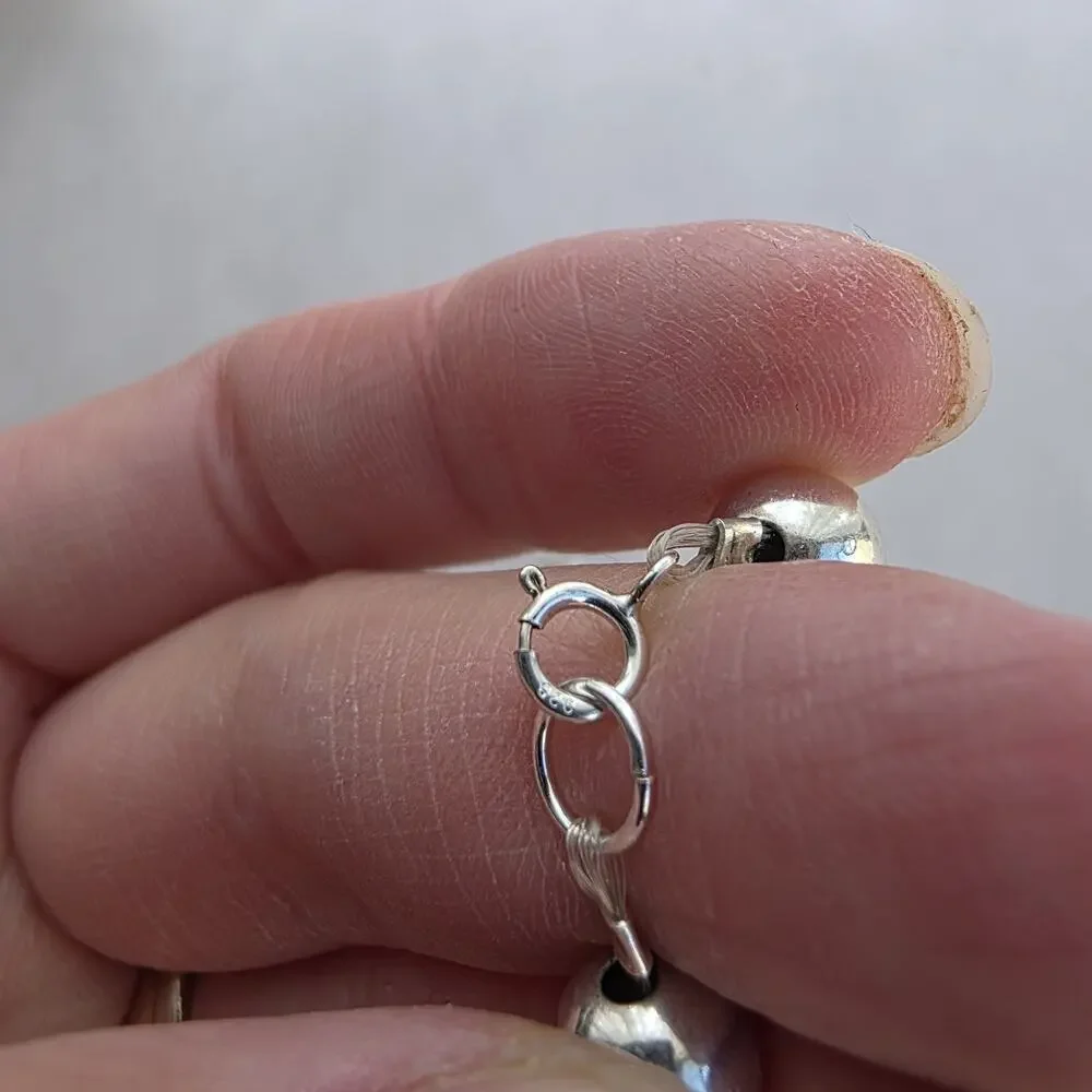 Unbranded sterling silver